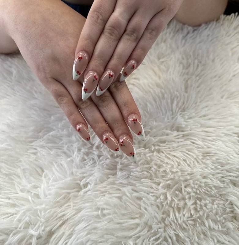 Professional pedicure with coral polish and flawless finish